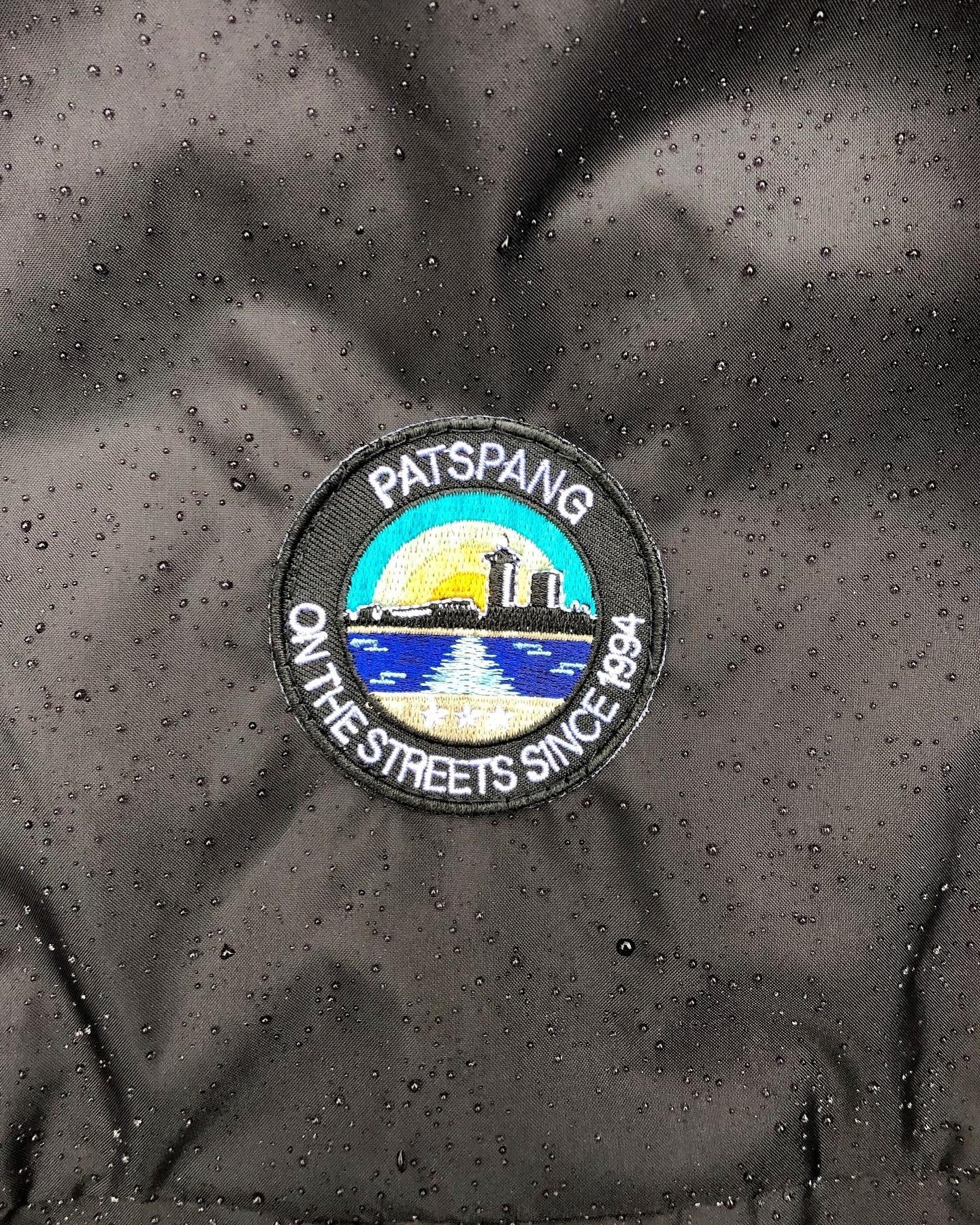 On the streets packable windbreaker